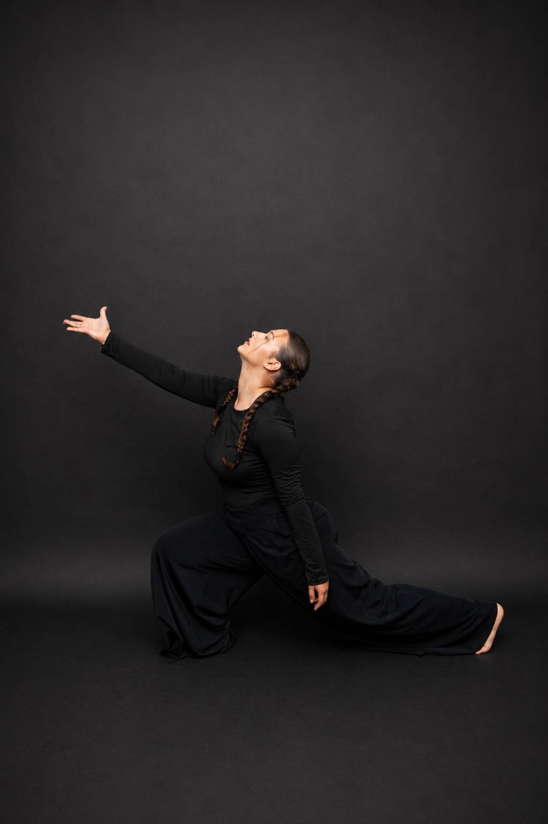 Belong dancer expressing a movement in a lunge