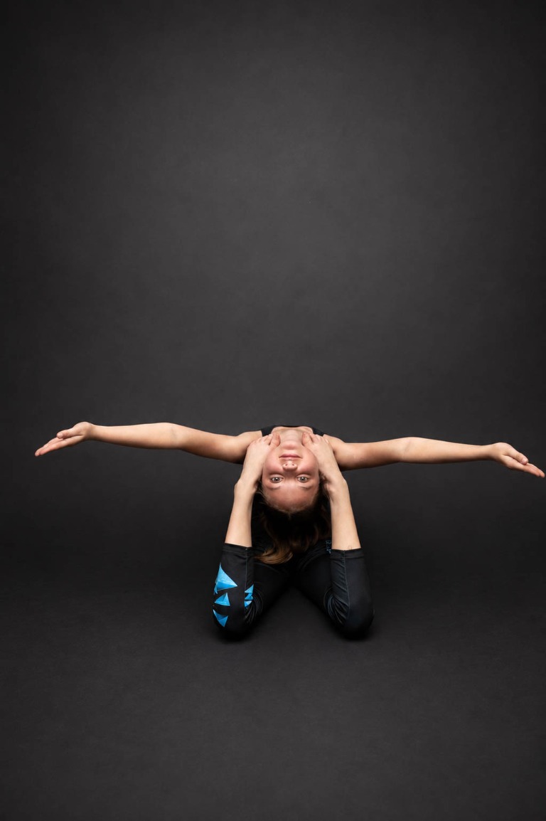 Belong dancer performing a backbend pose